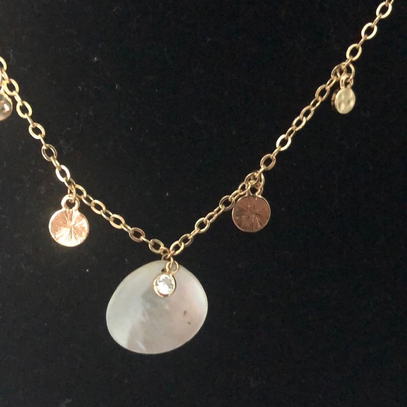 Ettika
18K Gold Plated Shell Disc Necklace - Picture 6 of 10